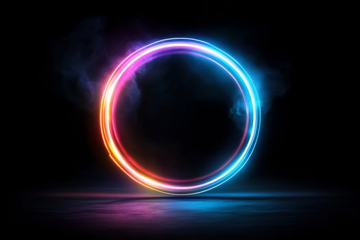 Glowing circle shape with neon lights on a dark background photo