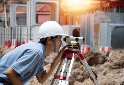 Concept Engineers are using level cameras for construction work photo