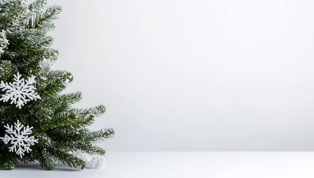 Christmas tree with snowflakes decoration on white background for festive holiday season photo