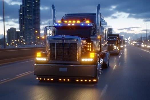 Semi truck fleet transporting cargo on highway at dusk photo