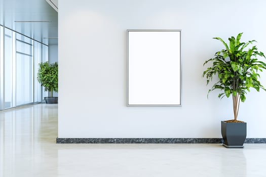 Blank frame display in modern interior with potted plant for mockup photo