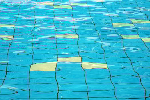 Pure blue water in the pool. Water background.Texture of the water in the pool. photo
