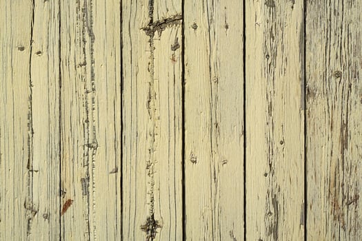 Yellow wooden fence background photo
