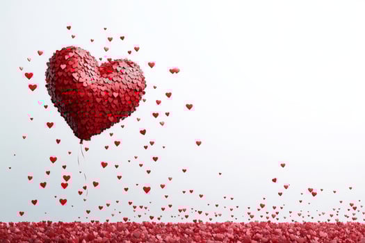 Heart Made of Small Red Hearts Floating in the Air During a Romantic Celebration or Festive Occasion. photo