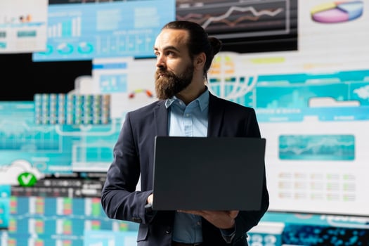 General director reviews digital graphs and business insight to improve new strategy models for successful development decisions. Optimizing performance with fintech and insightfulness. photo