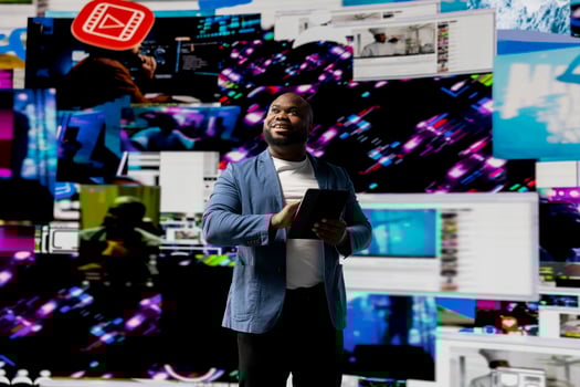 Black young social network user checks dashboards with dynamic screens showcasing social media and networking, highlighting the importance of online engagement and global connection. photo