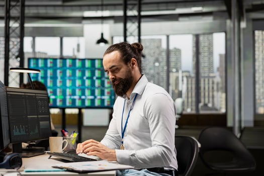 Office employee engages in brainstorming sessions and data analysis, leveraging insights and technology to align the strategy with objectives and support for efficient project execution. photo