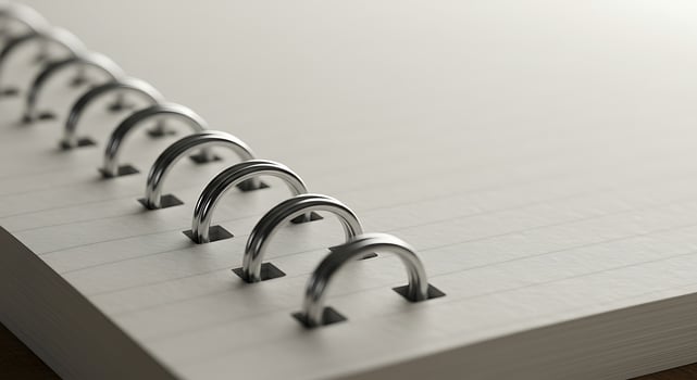 Open Notebook with Metal Binding Detail. photo