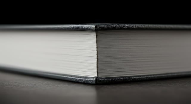 Close up of a book on a black surface photo