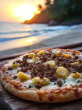 Delicious Pizza with Pineapple and Sausage by the Beach at Sunset. photo