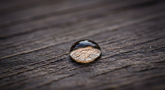 Water Drop on Wood Surface Macro photo