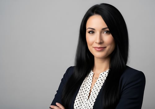Professional woman in business attire with dark hair photo