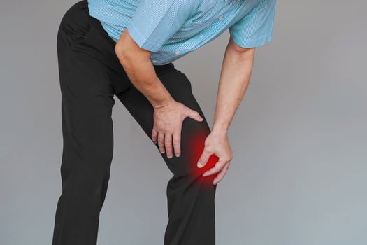 Caucasian old man knee ache, healthcare concept photo