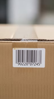 Cardboard Box with Barcode Label Close-Up photo