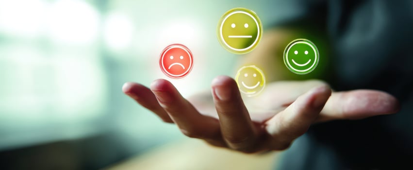 The hand displaying various emotional feedback icons for user interaction. photo