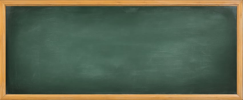 The empty chalkboard awaiting creative lessons and ideas for students. photo
