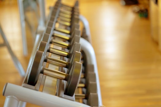 Close-up dumbbell in the gym in room photo
