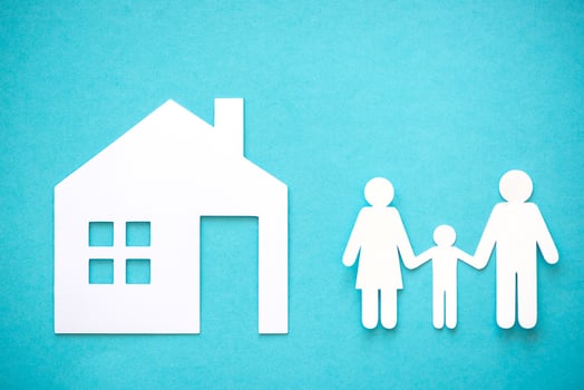 Paper cut of family on blue background photo