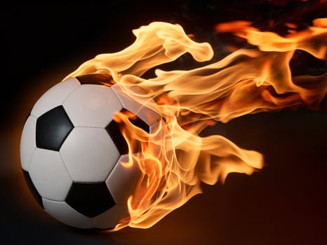 A dynamic soccer ball engulfed in flames, showcasing energy and excitement in sports. photo