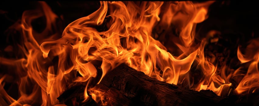 The mesmerizing dance of flames illuminating a cozy fire scene photo