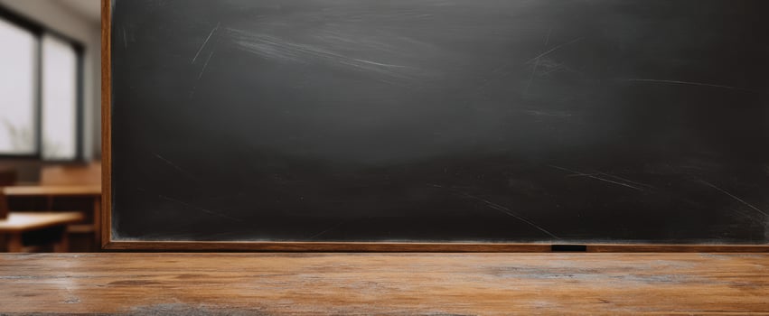 The empty blackboard ready for teaching and learning purposes in a classroom setting. photo