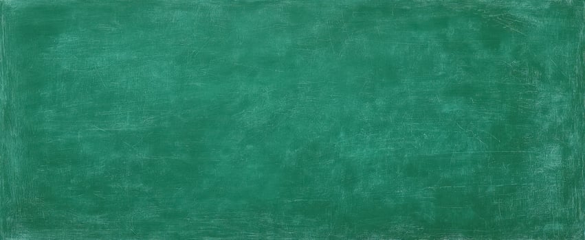 The textured green chalkboard with a rich, vintage appearance in the classroom. photo