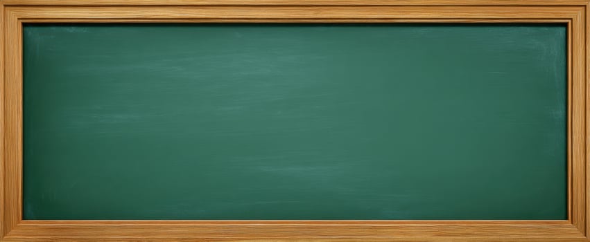 The classic green chalkboard in a wooden frame for educational settings photo
