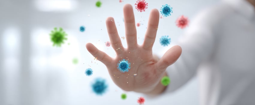 The hand demonstrating protection against viruses and germs in a clean environment. photo