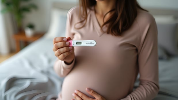 Flat Young woman holding pregnancy test in hand depicting pregnancy confirmation and emotional moment in personal setting concept as Young woman holding pregnancy test in hand dep Act 2 photo