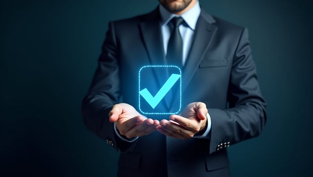 Flat Businessman holding holographic digital check mark icon symbolizing standard quality control certification assurance guarantee for automation process in empty space concept as Act 6 photo