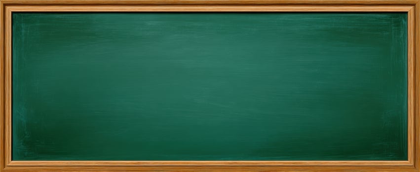 The green chalkboard ready for lessons and creativity in the classroom. photo