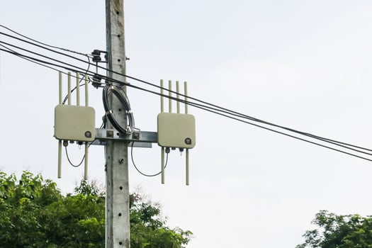 Public Internet Signal Device on Utility Pole photo