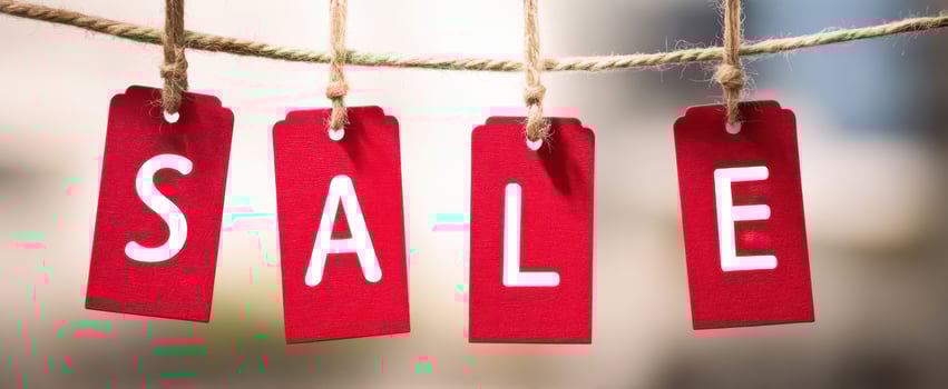 The Sale Tags Hanging to Attract Shoppers and Boost Sales photo