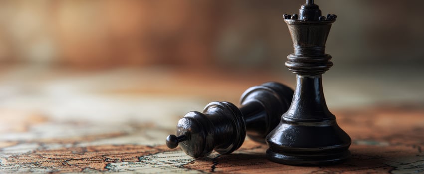 The Chess Pieces on a Vintage Map Representing Strategic Competition photo
