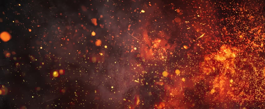 The mesmerizing dance of fire and glowing particles in motion photo