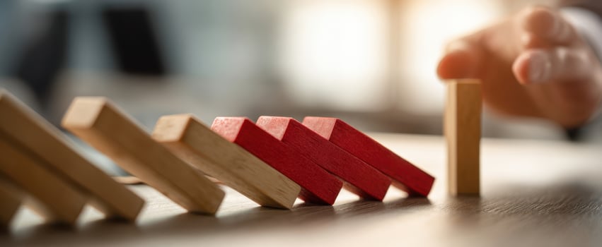 The domino effect and intervention in a business decision-making process. photo