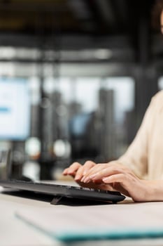 Close up of woman analyst focusing on development strategy and planning organization for global expansion, using digital tools to forecast data insights and achieve corporate growth. photo