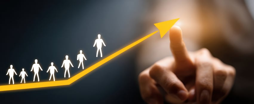 The Finger Pointing to a Rising Arrow of Team Growth and Leadership photo