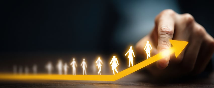 The Arrow of Progress With Glowing Human Figures Rising Toward Success photo