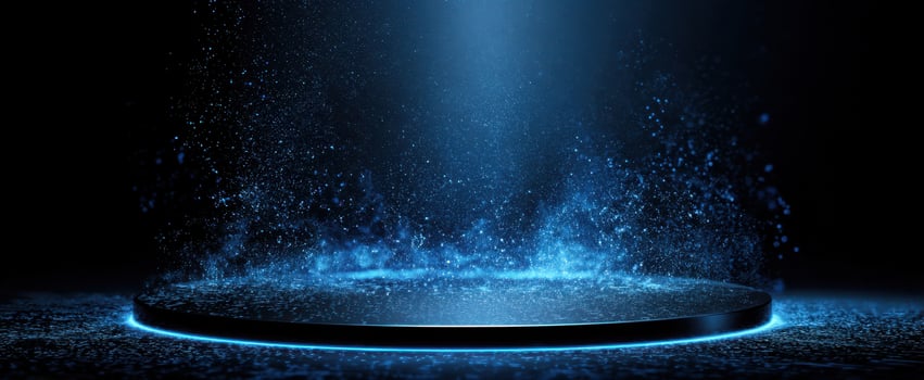 The platform glowing with blue light and sparkling particle effects in darkness photo