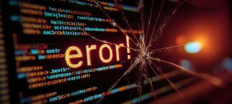 The Computer Screen Displaying Error Message Through Shattered Glass With Dramatic Lighting photo