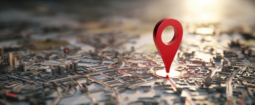 The red location pin on a detailed 3D city map at golden hour photo