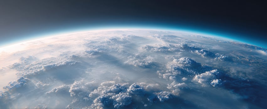 The Earth from Space with Curved Cloud Covered Horizon and Atmospheric Glow photo