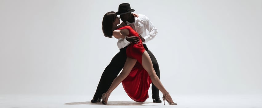 The Tango Dancers in a Dramatic Embrace Showing Passion and Grace on Stage photo