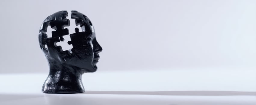 The head sculpture with missing puzzle pieces symbolizing mental health and cognition photo