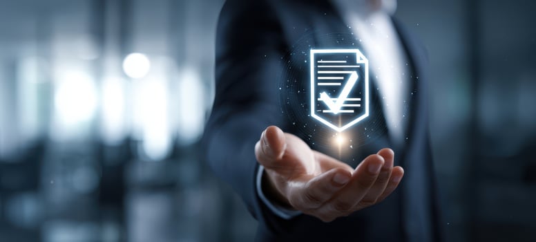 The Holographic Document Icon Floating Above an Open Hand in Modern Office Environment photo