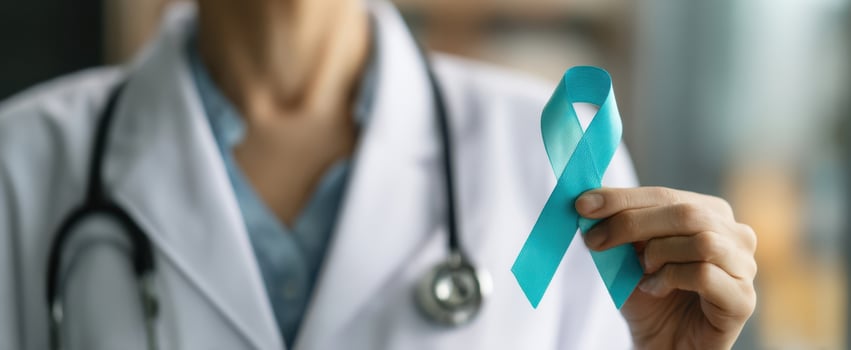 The Teal Ribbon Held by a Medical Professional Promoting Health Awareness and Support photo