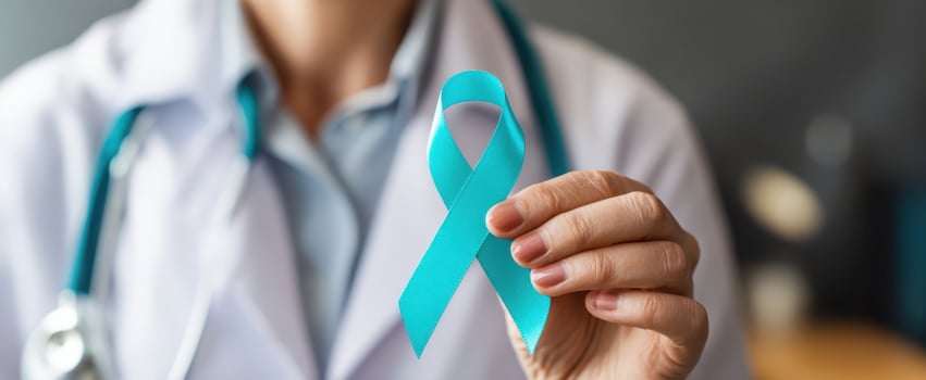 The Teal Ribbon Held by a Doctor Symbolizing Health Awareness and Support photo