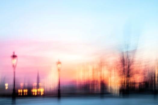 City sunrise, motion blur, pastel sky, calm waterfront, urban tranquility, website banner photo
