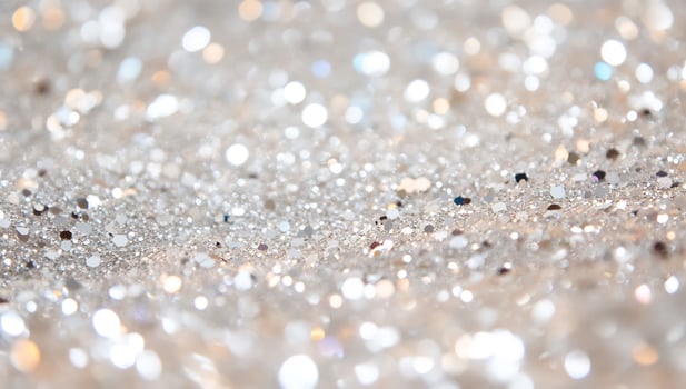 Sparkling silver glitter bokeh background, ideal for festive designs photo